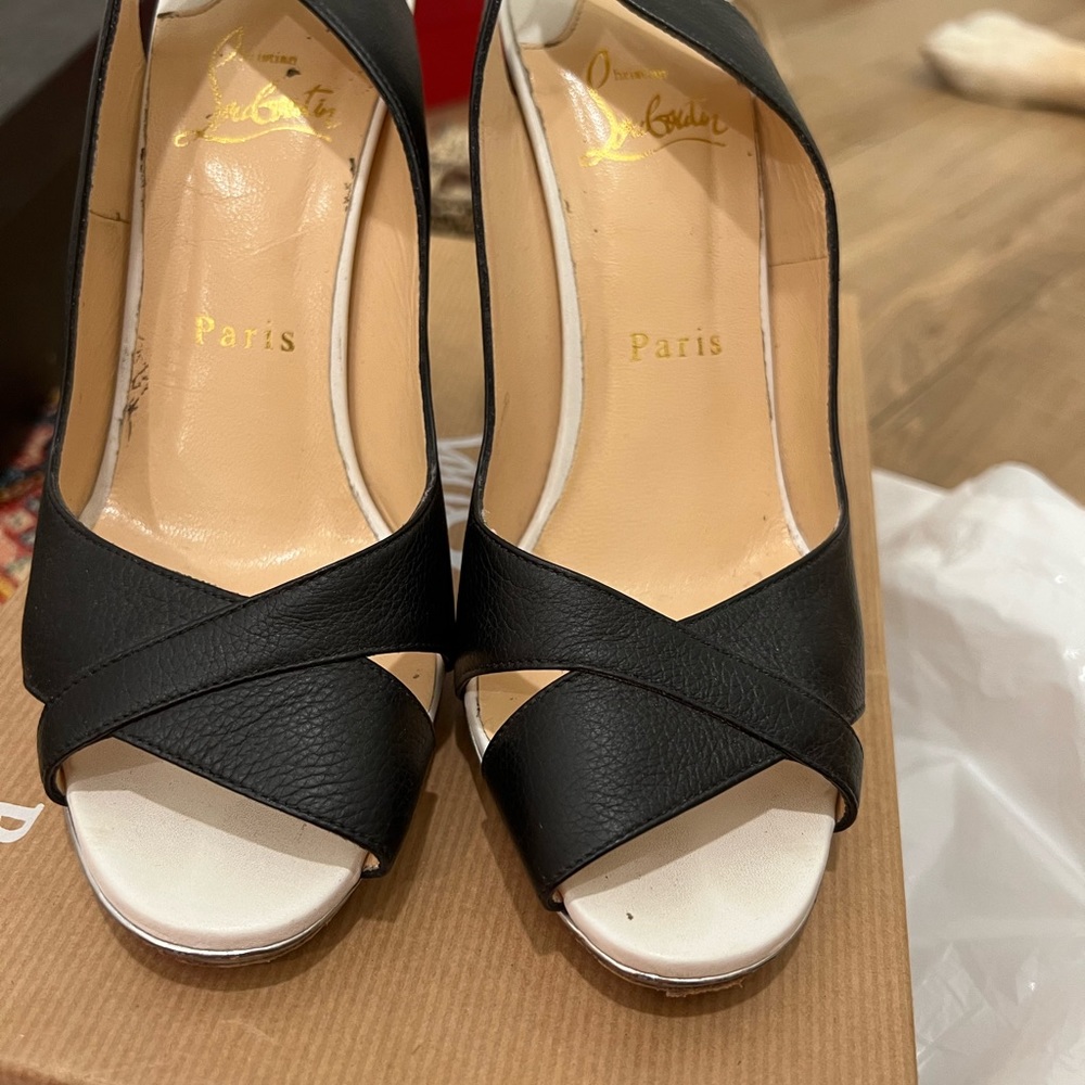 Christian Louboutin multi-colored sandals.